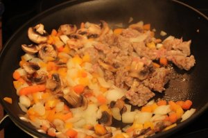 brown sausage and vegetables for easy pasta and sausage