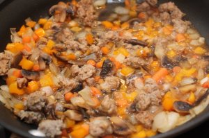 add browth and simmer - easy pasta with sausage
